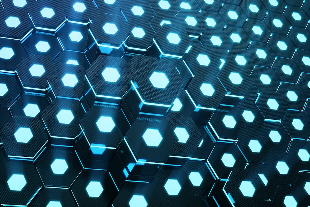 Blue abstract hexagonal glowing background, futuristic concept, 3D rendering Will Graphene fulfil its potential in healthcare?
