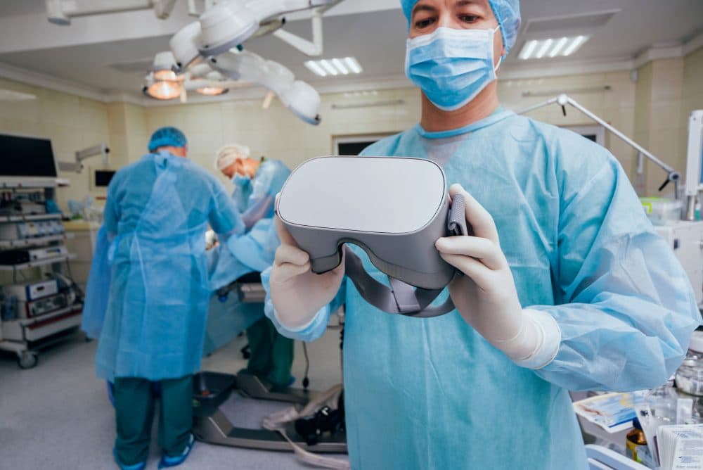 Doctor in a surgical room with virtual reality glasses New rules could add burden to medtech community