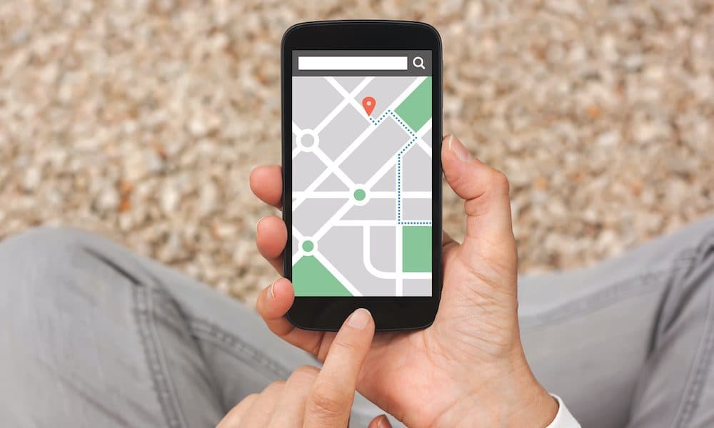 Hands,Holding,Smart,Phone,With,Map,Gps,Navigation,Application,On Indoor ‘sat nav’ launched for hospitals