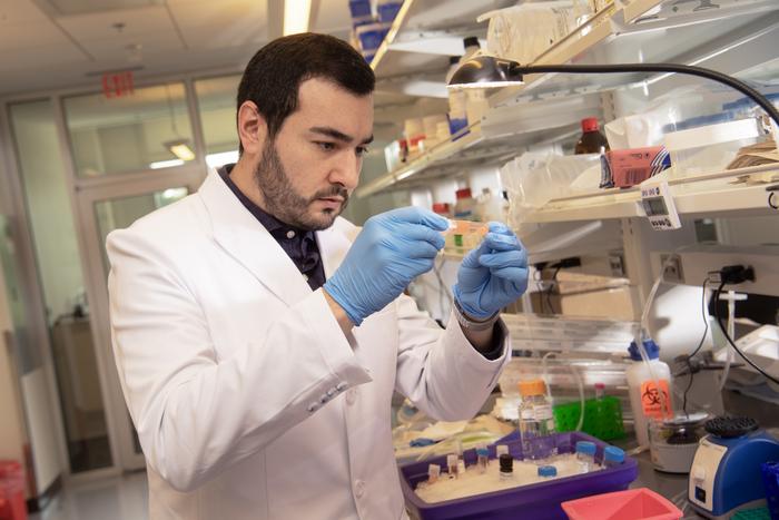 Low-Res_Eliver Ghosn_labcoat copy Nasal swab tests predict COVID-19 disease severity