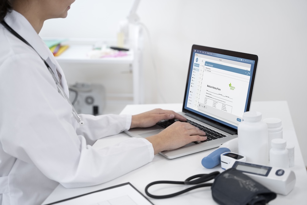 doctor-writing-about-routine-medical-checkup Boosting patient care and security with an SSO/AM solution