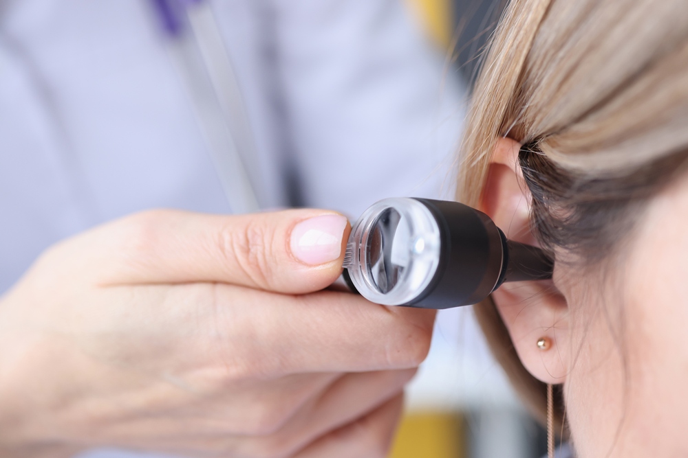 otorhinolaryngologist-looking-patients-ear-using-otoscope-closeup TympaHealth secures £2m for hearing tech